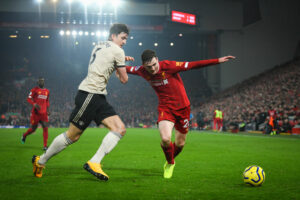 Andy Robertson, Liverpool, og Harry Maguire, Manchester United