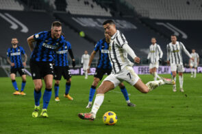TURIN, ITALY - FEBRUARY 09: Cristiano Ronaldo of Juventus shoots during the Coppa Italia semi-final Juventus and FC Internazionale at Allianz Stadium on February 09, 2021 in Turin, Italy. Sporting stadiums around Italy remain under strict restrictions due to the Coronavirus Pandemic as Government social distancing laws prohibit fans inside venues resulting in games being played behind closed doors. (Photo by Chris Ricco/Getty Images)