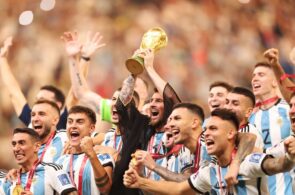 Lionel Messi lifts the World Cup trophy